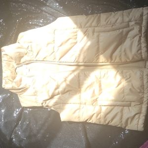 Puffer vest   color  beige and  marron  size small From  Newyork & company